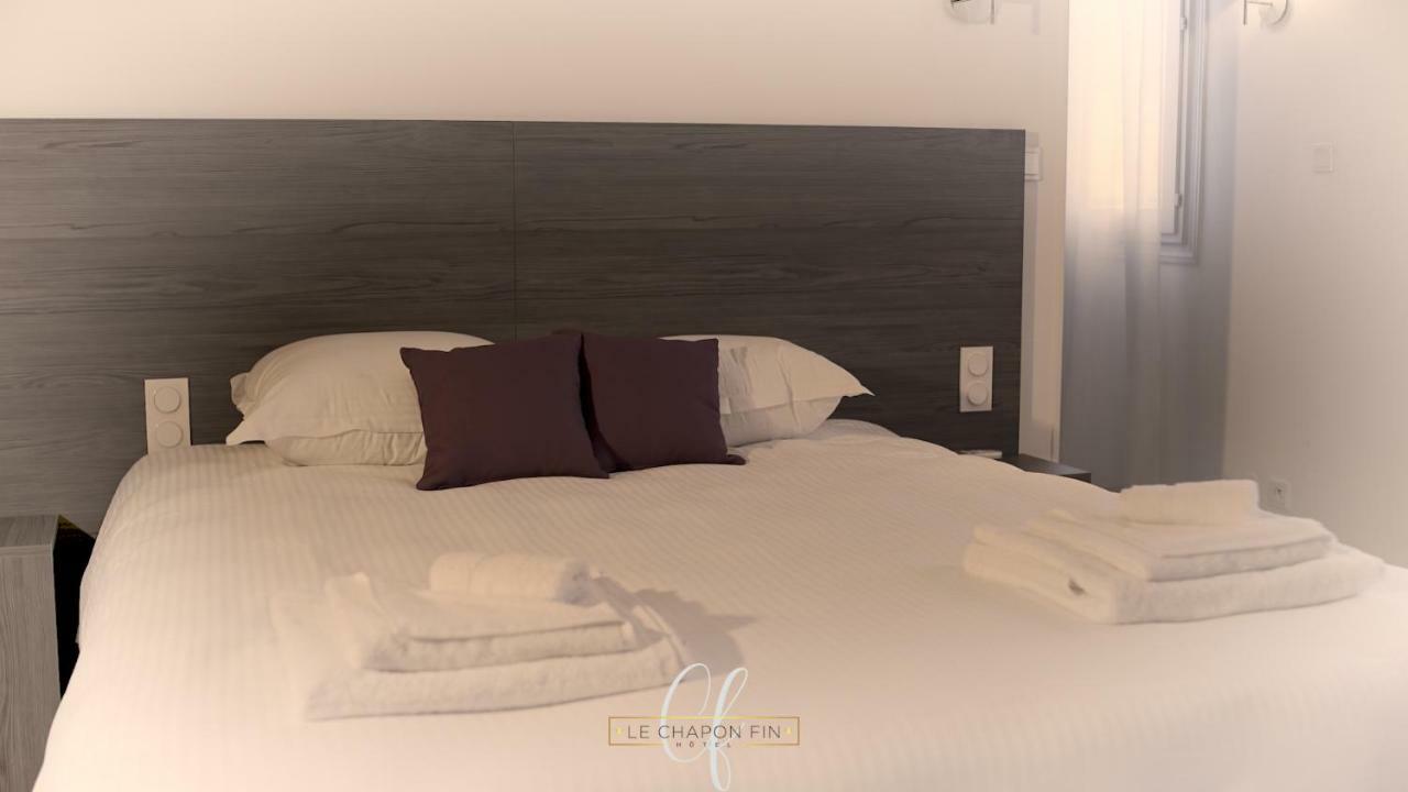 Hotel Le Chapon Fin Moissac Bagian luar foto